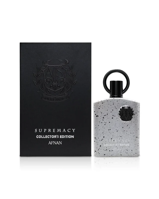 afnan SUPREMACY COLLECTORS EDITION perfume bottle beside box against white background